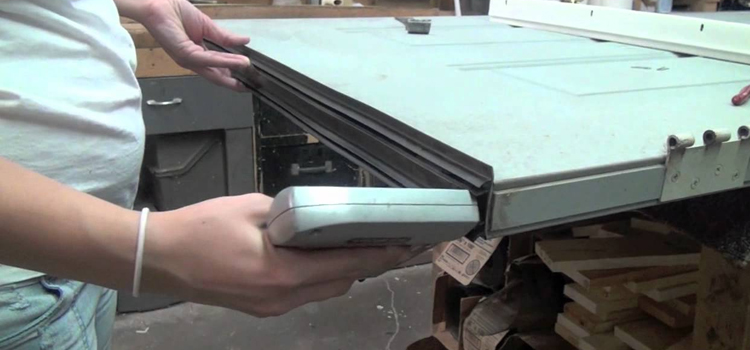 damaged steel door repair Kendall